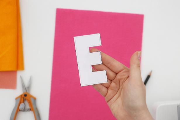Gather several colors of felt and print out the letter pattern. Choose which letter you want to make first and cut it out.