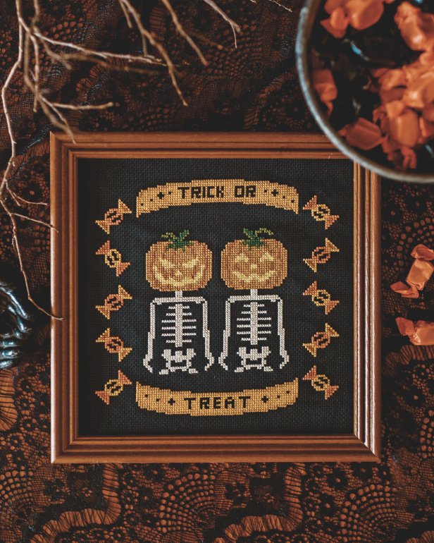 Cross-Stitched Pumpkin Heads on Skeleton Bodies, Reads Trick or Treat