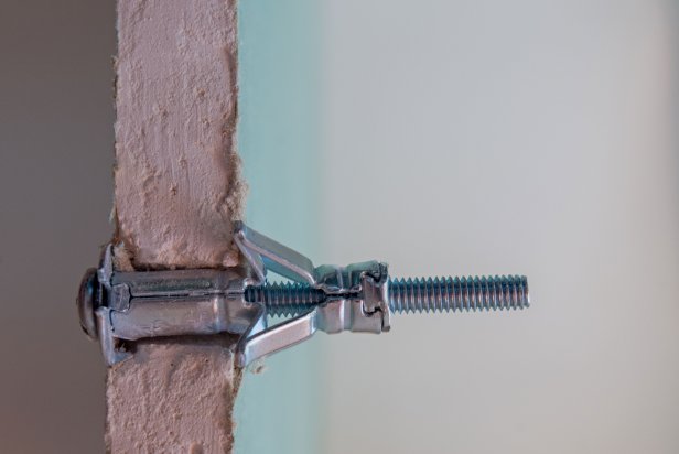 How to Install Drywall Anchors, Molly Bolts and Toggle Bolts | HGTV