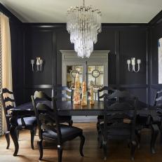 A Crystal Chandelier and Simple Paneling Makes this Formal Dining Room Grand