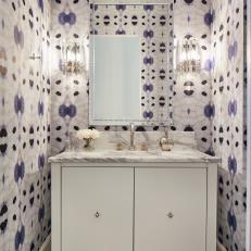 Bold, Colorful Wallpaper Print Accentuates the Natural Ceiling Curve in this Powder Room