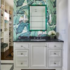 A Bold Banana Leaf Wallpaper Accent Wall Livens Up this Bathroom