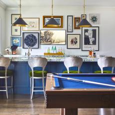 This Blue-Hued Game Room and Bar is Hiding Secret Appliances