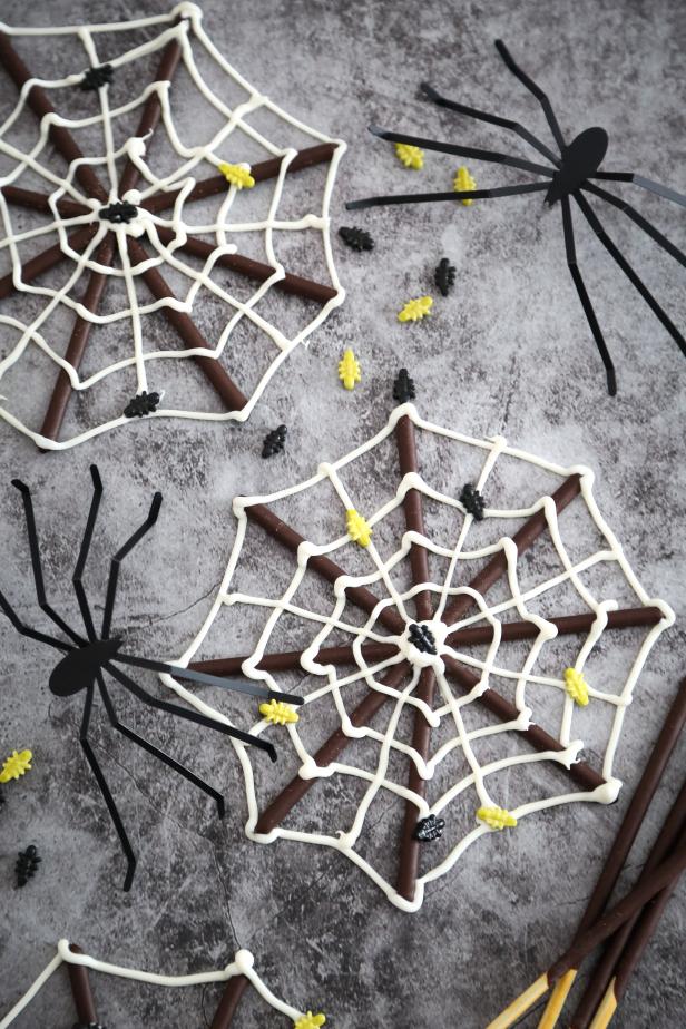 Spider Web Cookies Made From Biscuit Sticks and Melted Chocolate