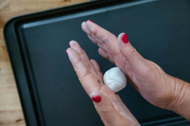 Start by breaking off a chunk of clay a little smaller than a ping-pong ball (Image 1). Soften it in your hands and work into a ball (Image 2). Then press your thumbs into the ball and start to form the pot (Image 3). Continue to work with the clay, pressing your thumbs in and pulling up with your other two fingers until the walls are about 1/4” thick. Don’t worry about getting the shape perfect. The organic shape is lovely and each one will be totally unique!