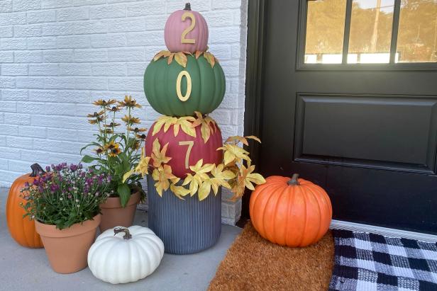 HGTV Handmade’s Danielle Boaz shares a fresh fall how-to for making a house number pumpkin topiary. To make your own, you will need a small, medium and large faux pumpkin, rust red, mauve and forest green craft paint, a large planter, super glue, plain metal numbers, gold spray paint, sponge brush and a utility knife.