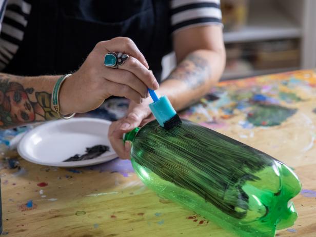Step 1: Paint the bottles using multi-surface black paint. More than one coat may be necessary, allow drying time in between.
