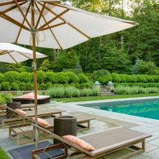 Poolside Patio With Orange Pillows
