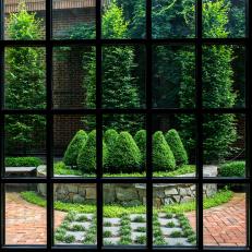 Black Framed Window and Courtyard