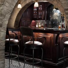 Traditional Neutral Bar With Brick Arches