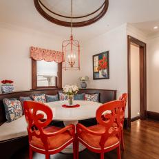 Traditional Breakfast Nook With Red Chairs