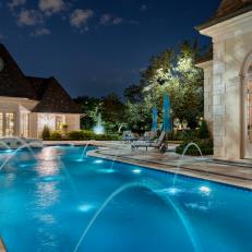 Swimming Pool With Fountains at Night