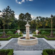 Formal Garden With Obelisk Fountain