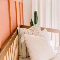Pillows and Orange Wainscoting