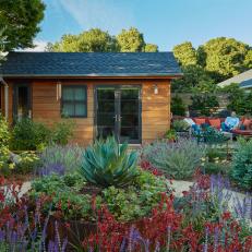 Backyard with Colorful Garden and Shed