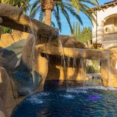 Pool With Waterslide and Cave