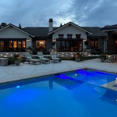 Patio With Big Blue Pool and Fire