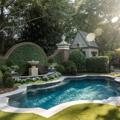Traditional Backyard With Unique Swimming Pool
