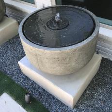 Container Water Fountain in Courtyard
