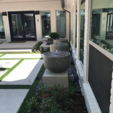 Courtyard With Container Fountains and Garden