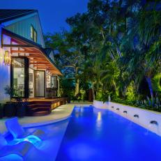 Tropical Backyard With Blue Pool Lights