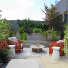 Rooftop Sitting Area With Orange Chairs