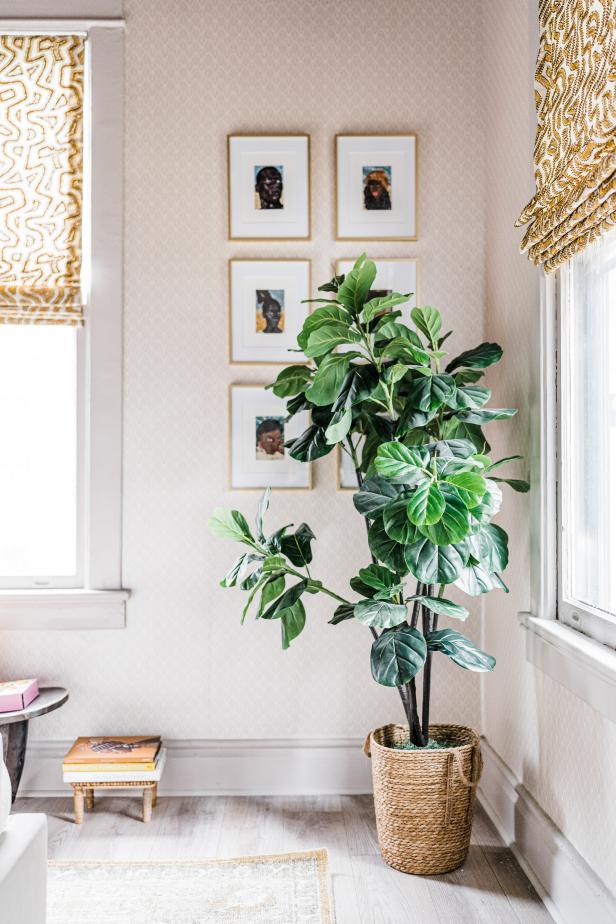 “The bedroom feels like home with lots of cultural references,” Joy reflects. Those references range from patterns and furniture to the large West African fiddle leaf fig that stands proudly in the corner of the room. “I love how fresh and open it feels,” she confesses. “Every afternoon a ton of sunlight floods in.” 

