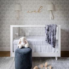 Gray and White Transitional Nursery With Stool