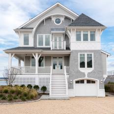 Gray and White Beach House With Tan Gravel