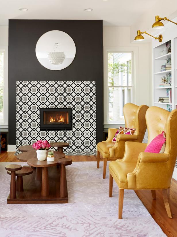 Living Room With a Patterned Tile Fireplace