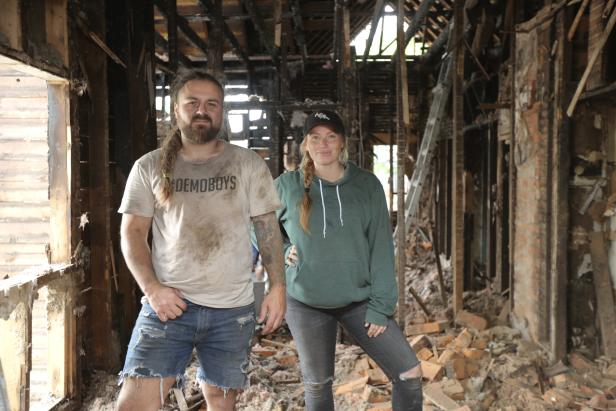 Mina and Tad posed for demolition day at the house on Charles in the Old Southside neighborhood that Mina and Karen renovated as seen on Good Bones