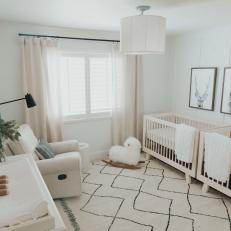 White Transitional Nursery With Raccoon