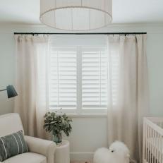 White Transitional Nursery With Rocking Sheep