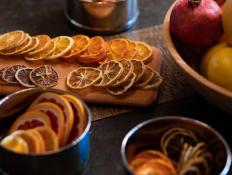 Use a dehydrator or your oven to turn oranges and other citrus fruits into colorful and oh-so-fragrant holiday decorations (without burning them).