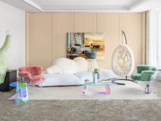 Neutral room with sculptural pastel furniture. 