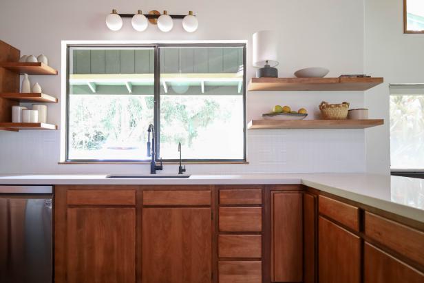 Kitchen With Wood Cabinetry and Shelving