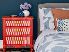 Eclectic Bedroom With a Painted Red Nightstand