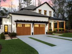 Solar-enabled exterior lighting provides eco-friendly lighting to the front of the home after the sun sets.