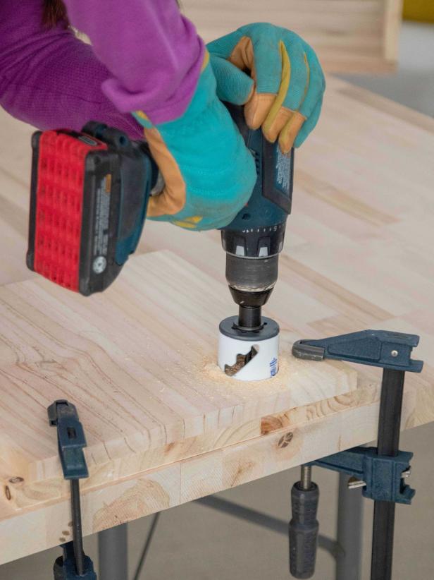 Use a 1-1/2&quot; hole saw to cut a hole big enough for a power cord to fit through on one of the 12&quot; x 12&quot; middle section side pieces. Sand until smooth.