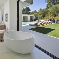 Modern, Residential Desert Landscape Design Blends Indoor and Outdoor Spaces, From Freestanding Tub to Infinity Pool