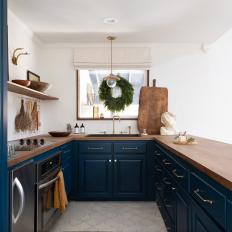 Blue Galley Kitchen With Wreath