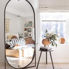Bedroom With Oval Mirror