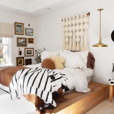 Eclectic Neutral Bedroom With Striped Throw