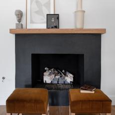 Black Fireplace and Gold Stools