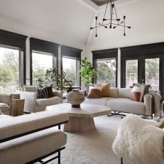 Neutral Contemporary Living Room With Black Windows