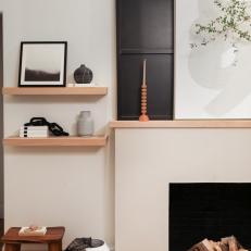 Black and Tan Fireplace and Open Shelves