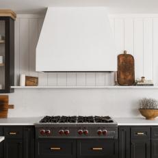 Black and White Kitchen With Cooktop