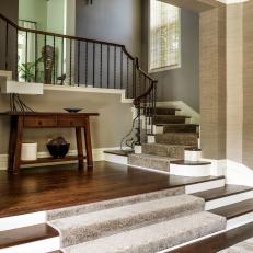 Hall and Stairs With Gray Rugs