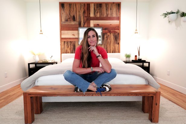 A posed portrait inside the Hodge master bedroom of host Kim Wolfe.