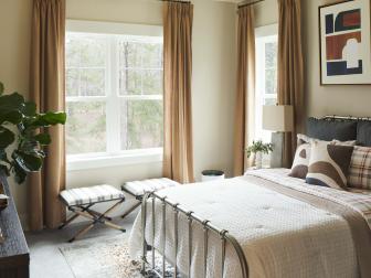“I wanted this room to be neutral, restful, emulate sand with a touch of sea in here,” said designer Tiffany Brooks. Soft tones of white, tan, brown and black bring a soothing feel to this relaxing space.